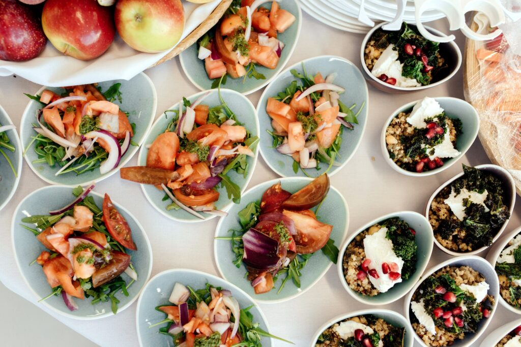 Individual appetizer cups prepared for a catered event