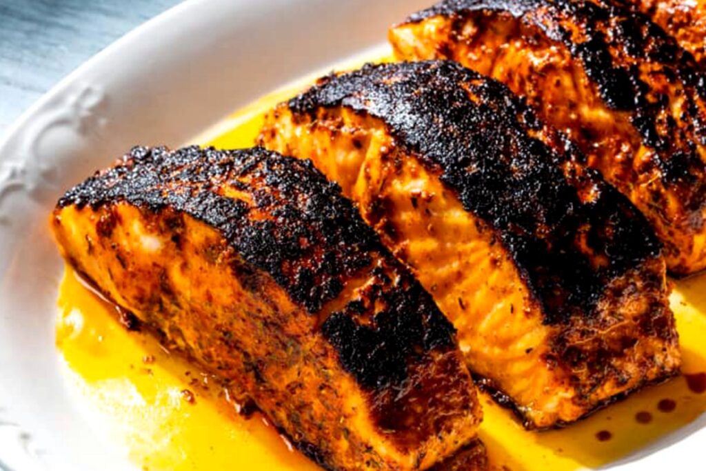 Close-up of blackened salmon prepared for catering
